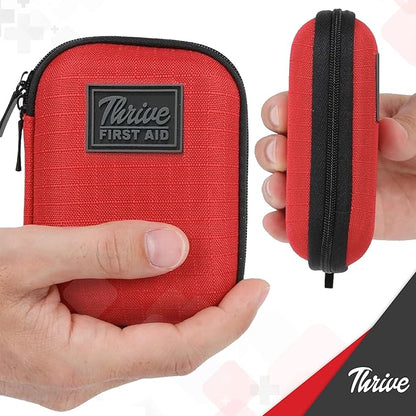 Thrive Travel Essentials Mini First Aid Kit – 66 Pieces of FSA and HSA Approved Supplies Including Bandages, Wipes, Safety Pins, and More | Compact Emergency Kit in Shell Case